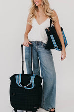 Boutique quilted roller suitcase