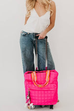 Boutique quilted roller suitcase