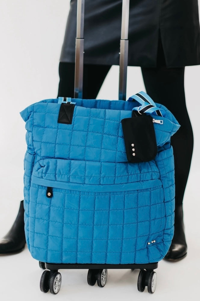 Boutique quilted roller suitcase